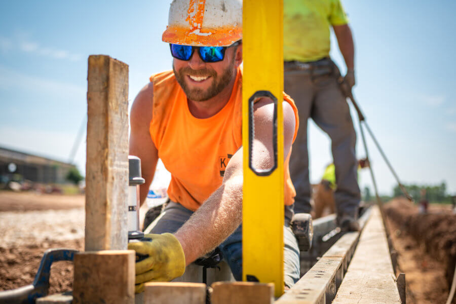 ksi-construction-worker-checking-level